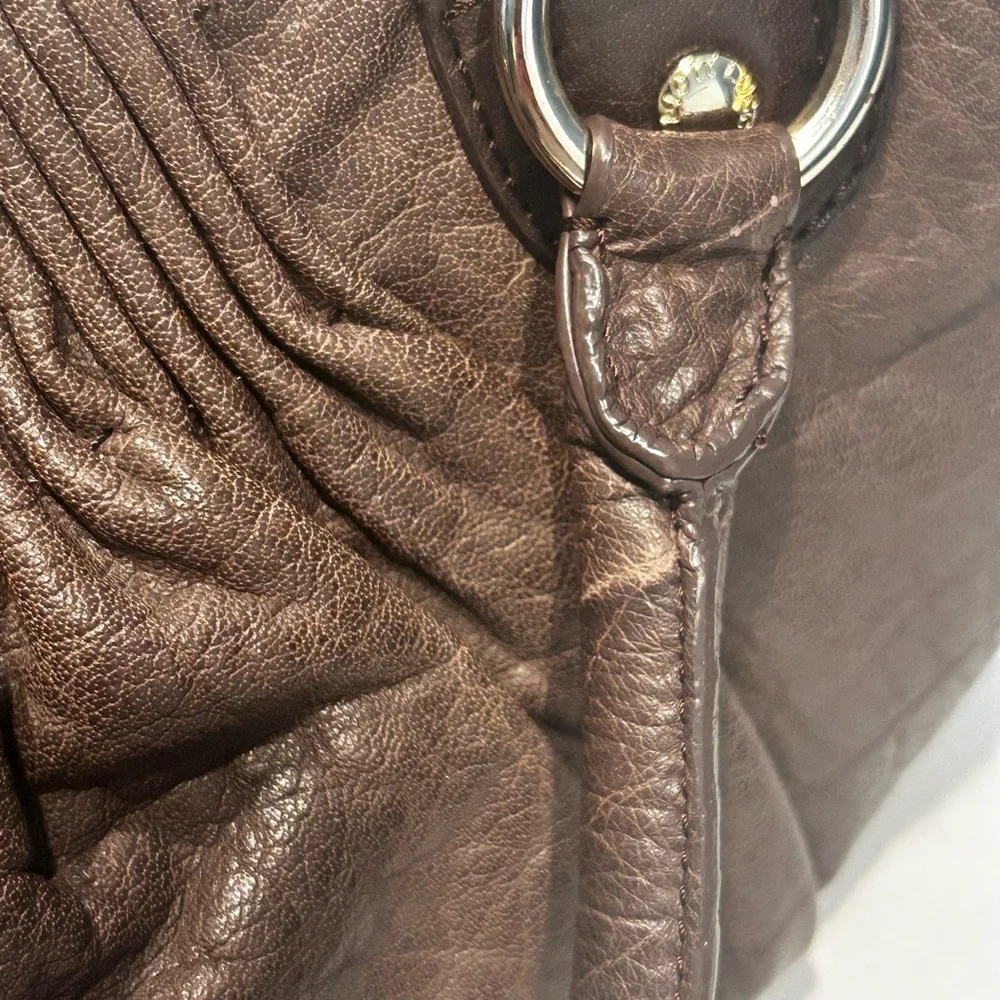 Elliott Lucca excellent used